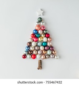 Christmas Tree Made Of Bauble Decoration. Minimal New Year Concept.