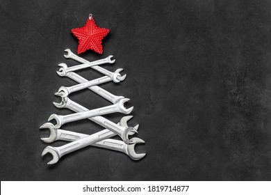 Christmas tree made from steel tools. Happy new year and merry christmas holiday. Copy space