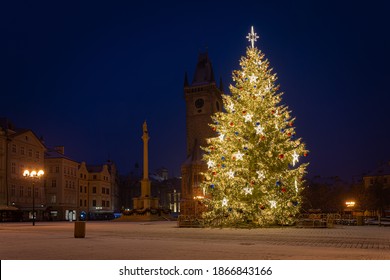 Christmas Tree And The Old Town Square In Prague, Czech Republic, Covered By Fresh Snow. No Christmas Markets Organized In 2020 Due To Covid-19