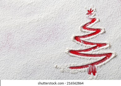 Christmas Tree On Flour Background. White Flour Looks Like Snow. Top View