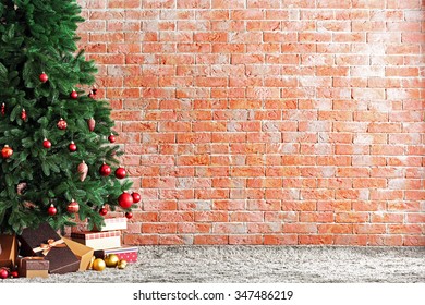 Christmas Tree With Presents In A Room On Brick Wall Background