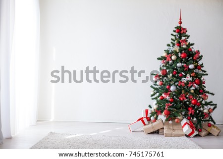 Christmas tree with red decorations new year gifts