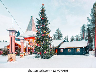 Christmas Tree And Santa Claus Village In Rovaniemi In Lapland In Finland.