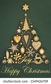 Christmas tree shape with gold joy sign, bauble decorations, symbols &  ornaments on mottled green background with happy christmas title. Abstract festive holiday theme.