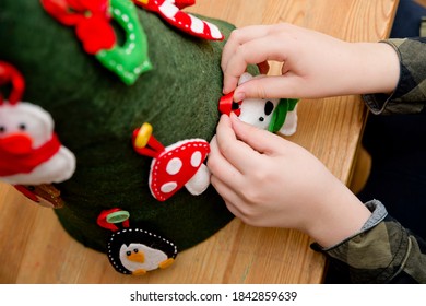 Christmas tree toy handmade from felt. Ergo therapy task for education. Fine motor skills for kids and disabled. Montessori methodology. Development, education. Activities at home. - Powered by Shutterstock