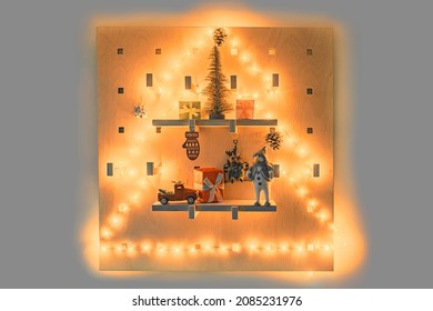 Christmas Tree Wall Decor Of Lighted Wood Pegboard Xmas Ornaments Decorations. Shaped String Light, Miniature Gifts, Stockings, Table Top Trees. Home Shelves.