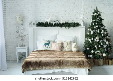 Christmas Tree With A White Bed In A White Room