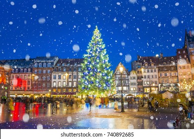 Christmas Tree And Xmas Market At Kleber Square At Night  In Medieval City Of Strasbourg - Capital Of Noel, Alsace, France.