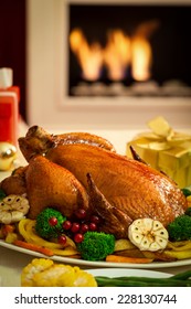 Christmas Turkey Dinner In Front Of Fireplace