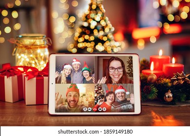 Christmas Video Call With The Family. Concept Of Families In Quarantine During Christmas Because Of The Coronavirus. Xmas Still Life With A Tablet In A Cozy Room