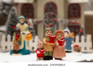 Christmas village singing caroler figurines