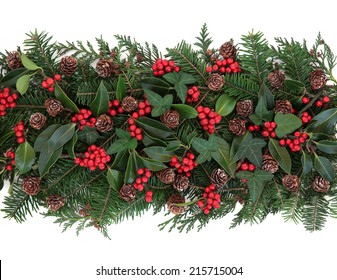 Christmas And Winter Flora With Holly, Ivy, Mistletoe, Spruce Fir And Pine Cones Over White Background.