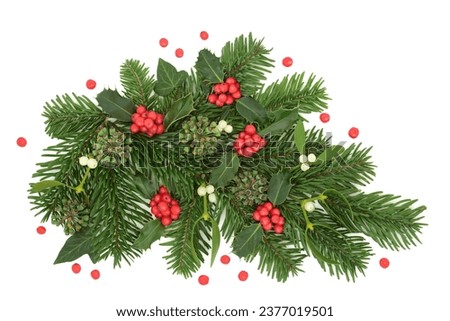 Christmas winter greenery decoration with holly, spruce fir, mistletoe, ivy, red berries on white background, Festive green greeting card design for New Year, Yule, Noel.