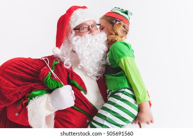 Christmas Wish 2016. Santa Claus and Little Girl. Telling Wishes