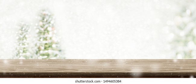 Christmas Wood Table Top At Blur Bokeh Christmas Tree Decor With String Light Background,Winter Holiday Greeting Card