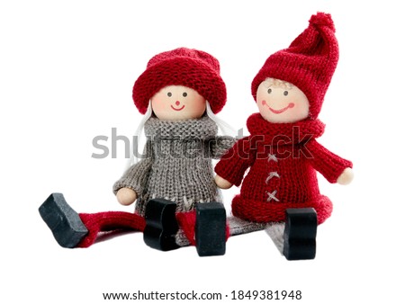 Christmas wooden puppet boy and girl isolated on white background. Christmas and New Year decor