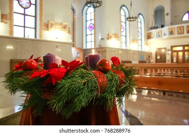 Christmas Wreath With Candles. Advent Wreath. The Interior Of The Catholic Church, Kazan City, Russia.