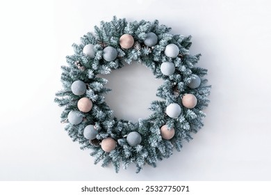 Christmas wreath made of live fir branches and toys on a white background, template for design, concept of Christmas and New Year's Eve, banner for content advertising with space for text. New Year - Powered by Shutterstock