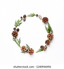 Christmas wreath made from natural cones and green twigs. Flatlay. Christmas template - Powered by Shutterstock