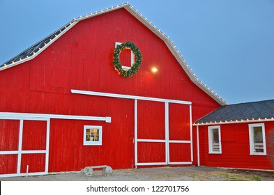 Christmas Wreath On Bright Red Barn