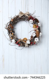 Christmas Wreath On White Wooden Background