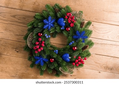 Christmas wreath on wooden background - Powered by Shutterstock