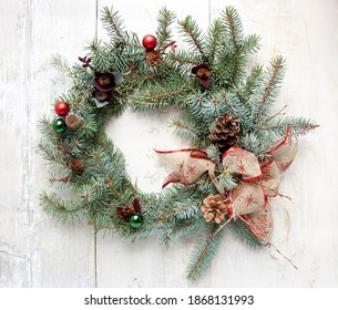 Christmas wreath on wooden tabletop