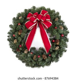 Christmas Wreath With Red Bow On White Background