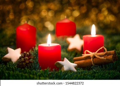Christmas wreath with red candles and Christmas decoration on the second Sunday in Advent