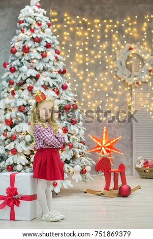 Christmas Xmas Casual Gold Studio Decorations Stock Photo Edit Now Christmas Xmas Casual Gold Studio Decorations With Cute Girl And Huge Mirror Golden Frame Plenty