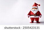 Christmas Xmas concept paper origami of Santa Claus, Saint Nick, Kris Kringle isolated on white background with copy space for your design for the December winter holiday