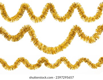 Christmas yellow golden foil tinsel isolated on a white background