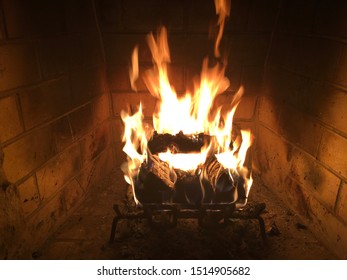 Christmas Yule Log Burning In Fireplace.