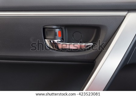chrome door handle inside of new car