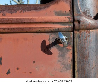 A Chrome Door Handle In A Vintage Truck