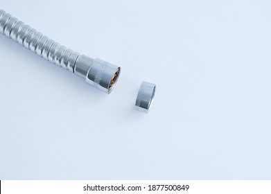 Chrome Metal Liner Shower Head Hose Broken. White Background.