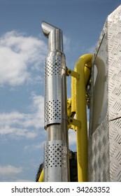 Chrome Truck Exhaust Pipe Against The Blue Sky