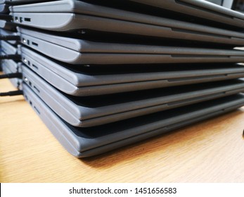Chromebooks in a pile charging their batteries