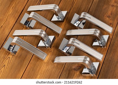 Chromed door handles for wooden doors. Door furniture