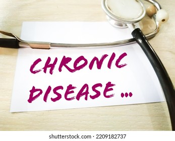 Chronic Disease Medical Term On White Background With Stethoscope.