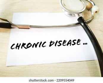 Chronic Disease Medical Term On White Background With Stethoscope.