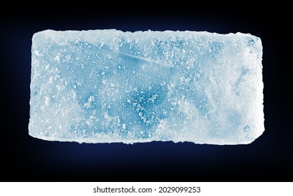 Chrystal clear frosty textured natural ice block in cold light blue tones, isolated on black background. 