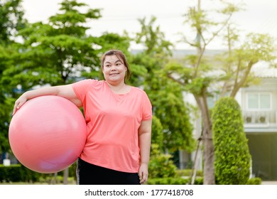 Chubby Happy Woman Exercise Or Yoga On Green Natural Tropical Garden At Home For New Normal Condition After Corona Epidemic.weight Woman Go On Diet Activity Fitness For Good Health And Strong Health