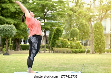 Chubby Happy Woman Exercise Or Yoga On Green Natural Tropical Garden At Home For New Normal Condition After Corona Epidemic.weight Woman Go On Diet Activity Fitness For Good Health And Strong Health