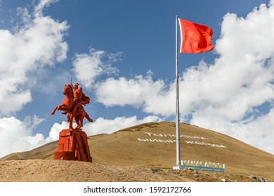 Chui Area, Kyrgyzstan - October 07, 2019: Monument To Manas And The State Flag Of Kyrgyzstan. Epic Of Manas. Monument To The Hero Of The Kyrgyz People.