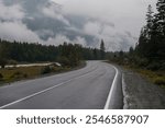 Chuisky tract - a road in the Altai mountains, mountains in the clouds in cloudy weather