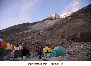 Chukung / Nepal - NOV 21 2019 : Tourists And Their Team At Island Peak Base Camp In The Evening