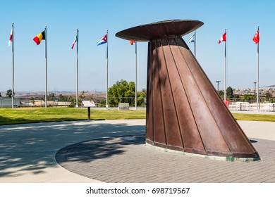 CHULA VISTA, CALIFORNIA - JUNE 30, 2017:  The Olympic Flame Cauldron And Courtyard With Flags Of Nations At The Chula Vista Elite Athlete Training Center, A Facility For Training Olympic Athletes.  