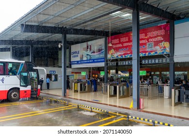 Chungking City,  CHINA - Nov 20 2020:  Busy Bus Station On A Rainy Day