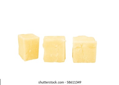 Chunk Of Cheddar Cheese Isolated Over White